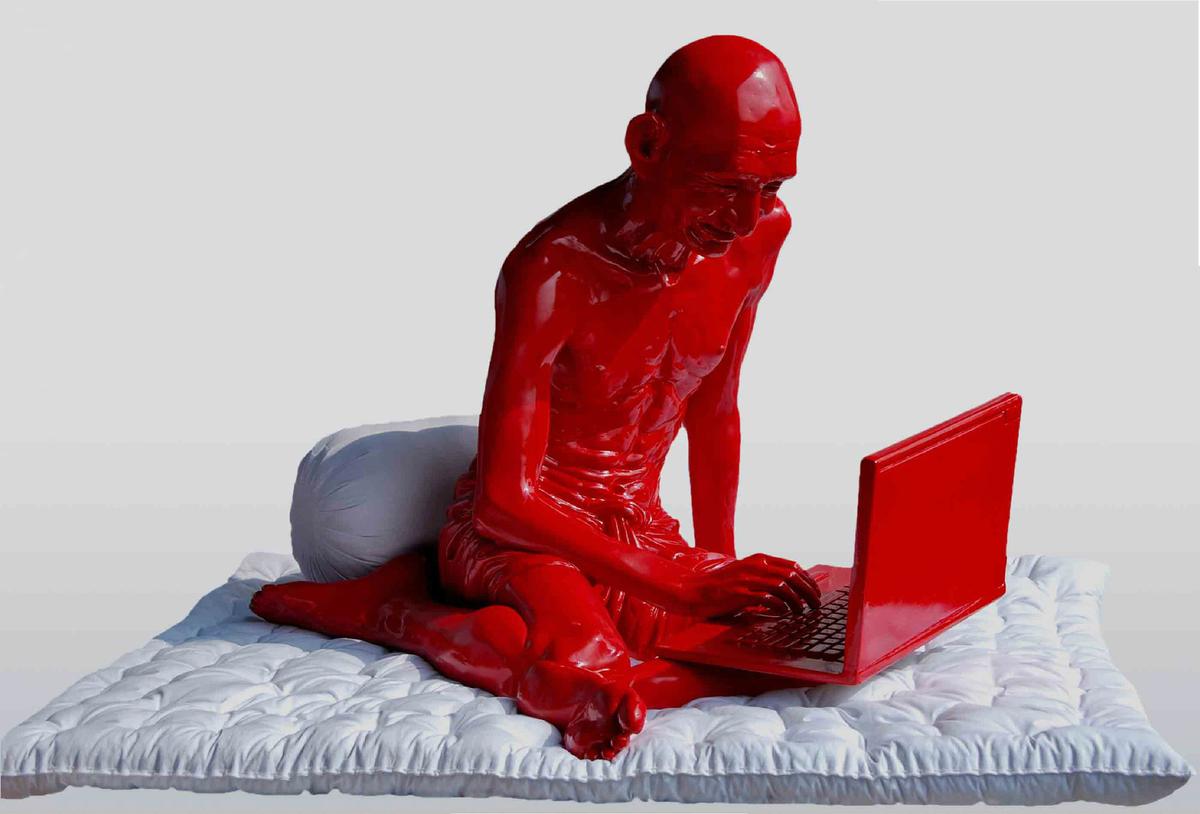 Gandhi And The Laptop by by Debanjan Roy.